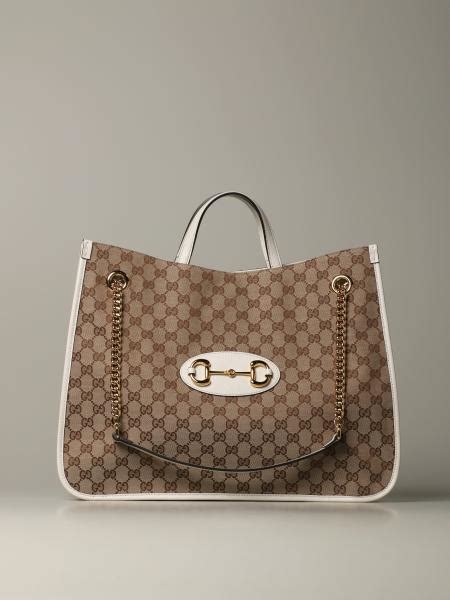 white gucci shopping bag